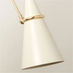 Aldus Ivory And Polished Brass Articulating Wall Sconce -Home Furnishing Store AldusIvNPldBrsArtlngScncAVSHF22