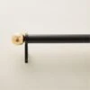 Boule Black Drapery Curtain Rod With Brass Finials -Home Furnishing Store BlDrp1p25inRdUlqBsBk48d88SHF21