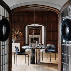 Surf Sling Black Leather Dining Chair -Home Furnishing Store CB2HOL22 04A hero