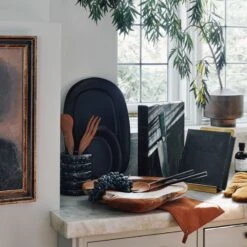 Sculpt Terracotta Large Black Platter 10 Sculpt Terracotta Large Black Platter -Home Furnishing Store CB2HOL22 20A Hero 1