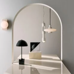 Venus Black Resin Modern Table Lamp -Home Furnishing Store CB2SP23 19A hero 1