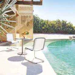 Enzo Natural Sunbrella ® Outdoor Armless Sling Chair Set Of 4 -Home Furnishing Store CB2SU22 16A v3 RET