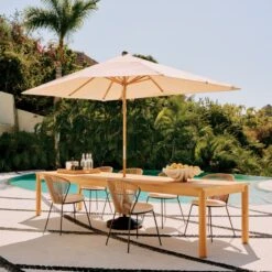 Peek Rattan Outdoor Dining Chair With Ivory Sunbrella® Cushion -Home Furnishing Store CB2SU23 RC 01A HERO