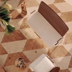 Colombe Ivory Metal And Rattan Outdoor Loveseat With Ivory Sunbrella® Cushions -Home Furnishing Store CB2SU23 RC 04B HERO V1