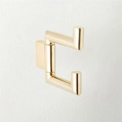 Kela Unlacquered Brass Swivel Hook